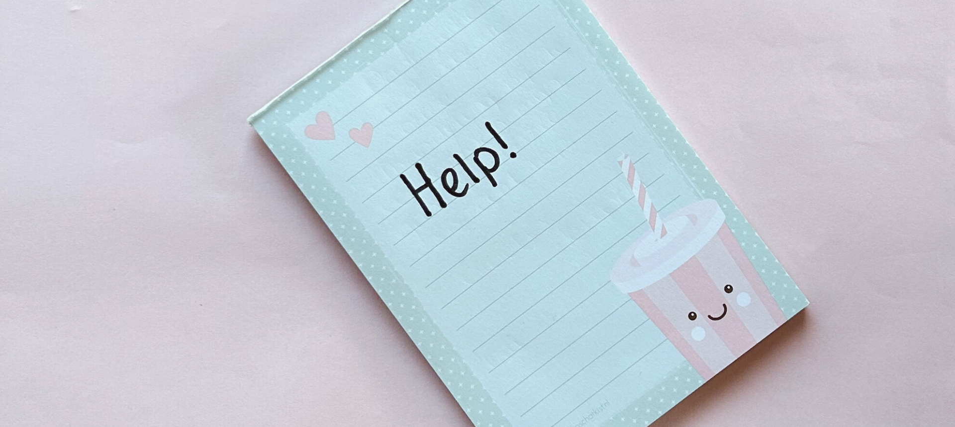 notitieblokje van studio schatkist met help erop