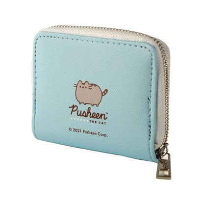 meisje stopt Pusheen portemonnee in rugtas 🎒