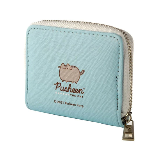 meisje stopt Pusheen portemonnee in rugtas 🎒